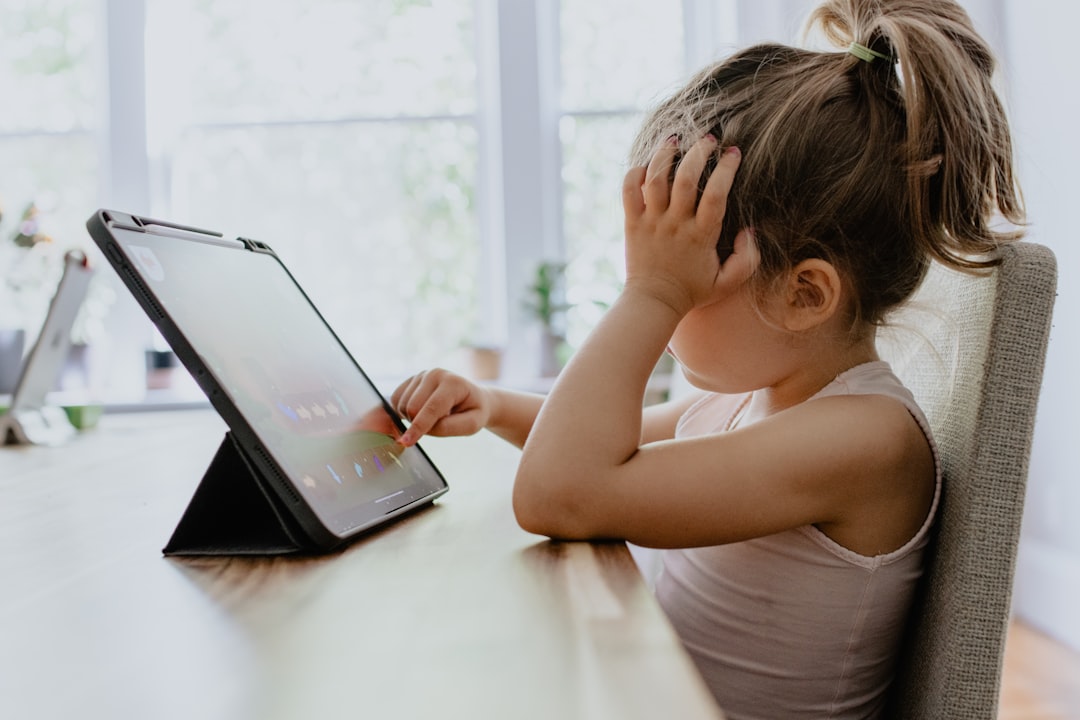 kid has meltdown when you take away iPad — photo by Kelly Sikkema on Unsplash