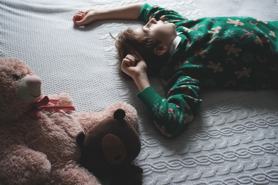 child asks for water stalling bedtime — photo by Tati Odintsova on Unsplash